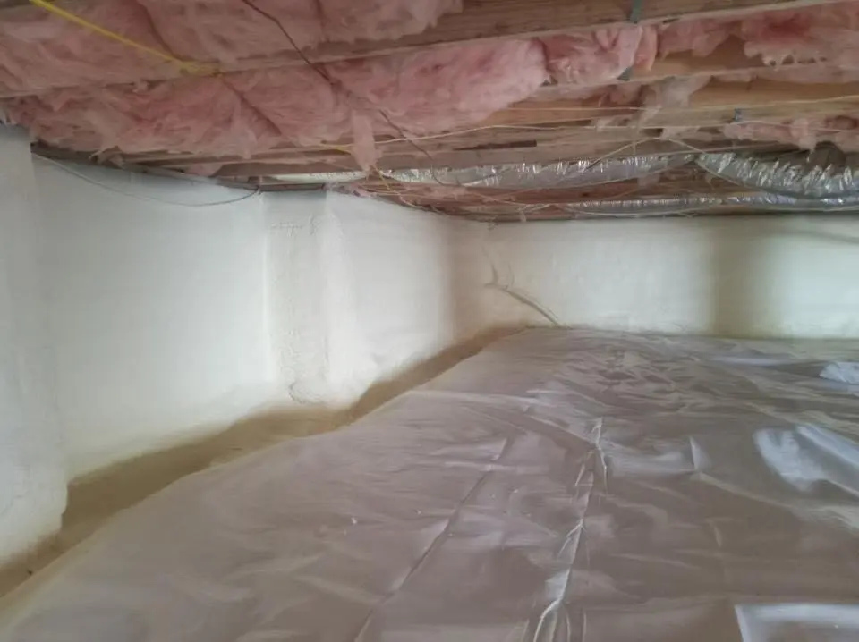 Crawl space encapsulation with closed-cell spray foam for Commercial Roof Restoration in Jacksonville